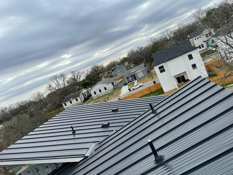 Standing seam metal roof panels with vents for Skylight Repair in Heeia
